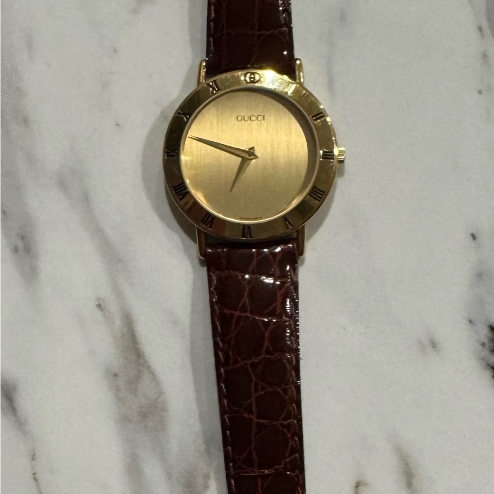 Gucci Gold Dial Watch with Dark Brown Strap